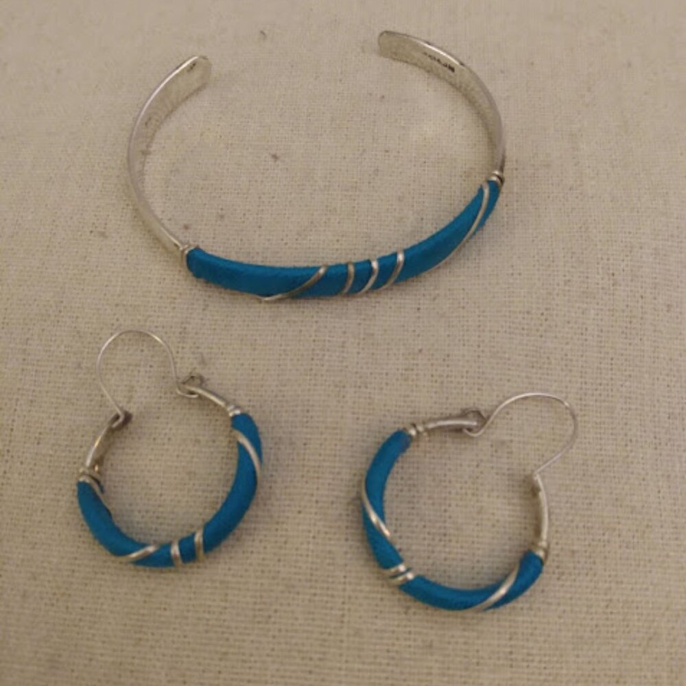 Mexico marked silver plated open cuff bracelet with matching wire earrings.